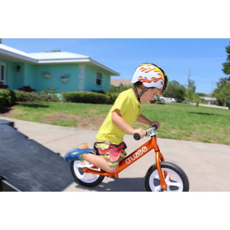 cruzeebalancebikeorangewithwhitewheelsaction Cruzee Balance Bikes