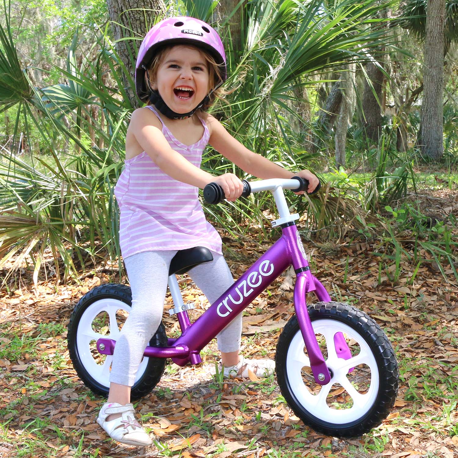 cruzee-balance-bike-purple-with-white-wheels-lifestyle